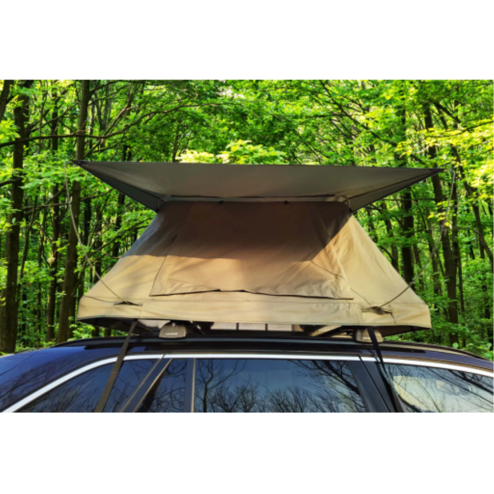 Forest green deluxe soft-top rooftop tent for 2-3 people mounted on a car in a wooded setting.