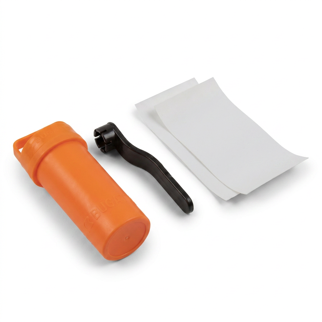 A photorealistic studio product photo of the Bugatti K&B Sport Inflatable Paddle Board Repair Kit, featuring an orange canister, a black wrench, and white rectangular patches. The kit is angled to the right on a seamless white background with a soft, natural shadow.