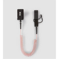 Coiled raspberry pink and white 7mm TPU paddle board leash with black padded ankle cuff.