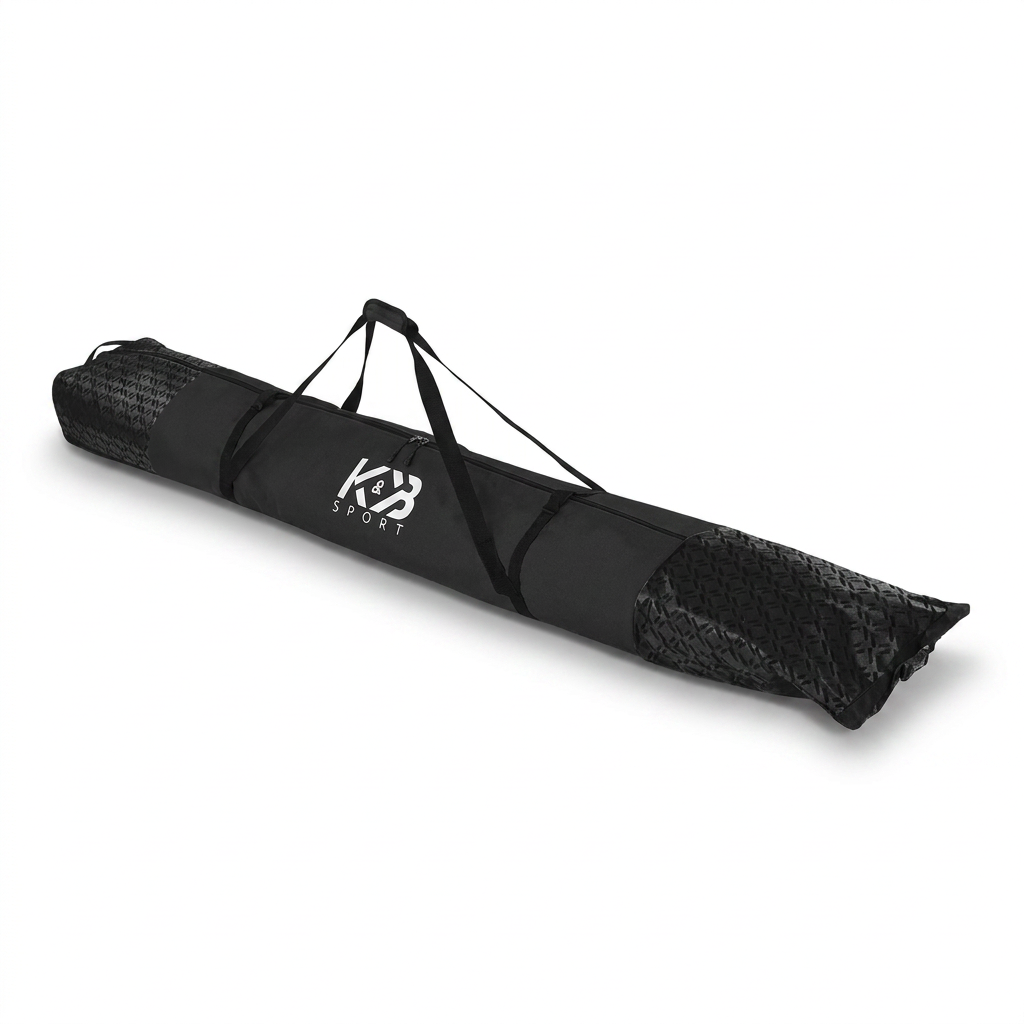 A photorealistic studio product shot of the black K&B Sport double padded ski bag (BPK5854-BLACK) angled to the left on a pure white background with a soft natural shadow.
