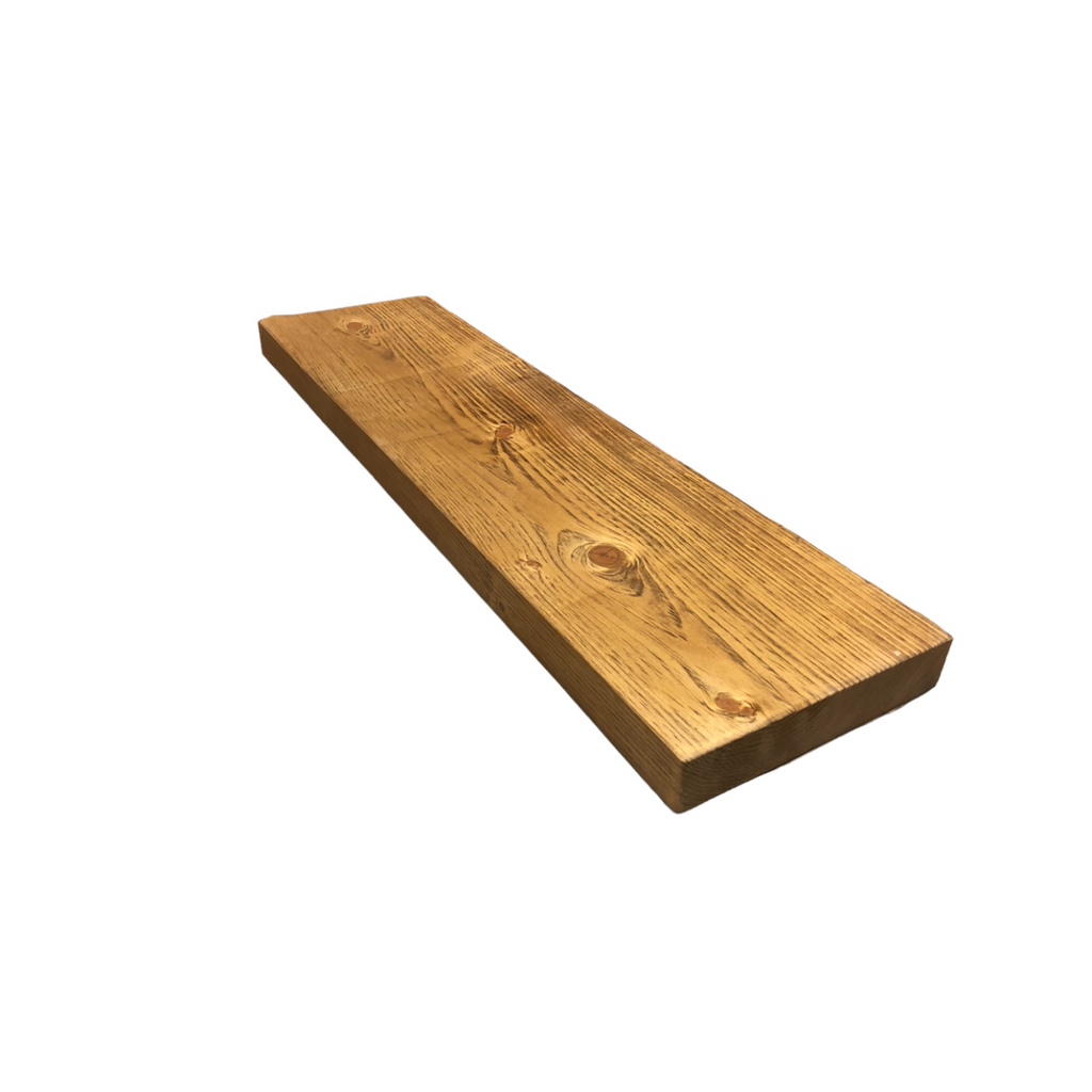 Honey Pine solid wood floating shelf (36x8x2) by Nomaad showing natural grain and knots.